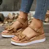 Sandalias casuales transfronterizas europeas y americanas para mujer, hebilla de moda, punta abierta, color sólido, tacón de cuña, talla grande, venta al por mayor transfronteriza