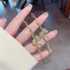 Pendientes de Borla de Tulipan de Alta Gama Transfronterizos Lujo Ligero Elegantes Nicho Gancho para la Oreja Mismo Estilo que Celebridades de Internet Aretes Pendientes de Moda