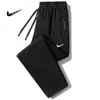 Pantalones de chándal holgados de pierna recta para hombre, talla grande, para primavera y otoño, joggers modernos con bolsillo y cremallera, pantalones casuales elegantes para hombre