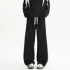 Pantalones de chándal pesados retro americanos nuevos 2026, holgados para hombre, pantalones largos casuales fluidos, pantalones de pierna recta modernos y elegantes
