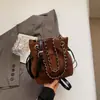 Bolso de Mano para Comercio Exterior Transfronterizo 2026 Nuevo Otoño e Invierno Cadena Bolso de Hombro de Nicho Moda Versátil Bolso Cruzado Tipo Cubo