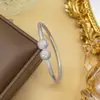 Pulseira para Mulheres Aço Titânio Europeia e Americana Não Desbota Cobre Inlaid Zircônio Pulseira Nicho High-End Moda Joias Atacado Joias de Mão