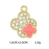 Versión coreana de accesorios de aleación para joyería DIY trébol de cuatro hojas gota de aceite taladro collar pulsera colgante colgante individual para colgar venta al por mayor