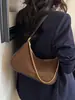 Bolso de hombro de diseño de nicho nuevo, bolso cruzado de alta calidad, bolso de hombro versátil y elegante, bolso de axila moderno para el día a día