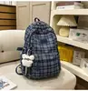 Mochila Escolar Estampada Estilo Retrô de Aparência Sofisticada para Mulheres no Outono e Inverno Nova Mochila Versátil Coreana Ins para Alunos do Ensino Fundamental II e Médio