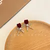 Aretes de Bola de Pelo con Lazo Rojo Ankora para Nochevieja, Exquisitos Retro, Simples, de Gama Alta y Versátiles, Pendientes Elegantes