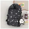 Nova mochila estilo comércio exterior para meninas, adequada para estudantes do ensino fundamental II e médio, com grande capacidade e design estampado de estrelas; também uma mochila para notebook para estudantes universitárias