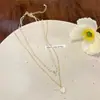 Colar de Coração de Camada Dupla Estilo Coreano para Mulheres, Gargantilha de Pérola de Luxo Leve Estilo Ins para Verão, Acessório Simples e Elegante Atacado