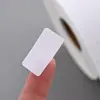 Papel recubierto papel adhesivo rollo de etiquetas logística express código bidimensional código de barras impresión etiqueta en blanco en stock al por mayor