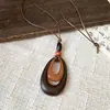 Nuevo collar con colgante de resina de doble anillo y cordón de cuero estilo chino, cadena para suéter retro artística de alta gama, gargantilla nicho de estilo étnico