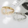 Pulsera de Sentido Avanzado Aleación Hojas Caladas Diseño Original Europeo y Americano Transfronterizo Personalidad Femenina Pulsera Abierta Joyería de Venta Caliente