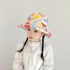 Sombrero de pescador para bebé al por mayor moda estampado pequeño fresco sombrero para el sol dos lados disponibles sombrero para niños versión coreana