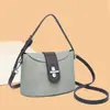 Bolso de mano estilo extranjero, bolso tipo cubo para mujer, nuevo bolso de hombro cruzado de moda transfronterizo Otoño 2026, bolso tote pequeño para salir