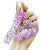 Llavero Luminoso de Motocicleta de Moda para Tiktok Figura Flotante Creativa de Acrílico Colgante de Botella de Arena Líquida Rellena de Aceite Venta al por Mayor