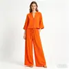 Atacado Roupas Femininas Transfronteiriças Primavera 2026 Novo Conjunto de Camisa Solta de Manga Longa com Decote V em Cores Doces e Calças de Cintura Alta para Mulheres