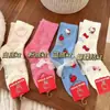 Calcetines de media pantorrilla Hello Kitty Calentitos de felpa gruesa Calcetines para el suelo del hogar Chica de dibujos animados linda japonesa Dulce