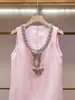 Shenzhen Nanyou Ropa Fina de Mujer Verano Nuevo Estilo Francés Elegante Pequeño Estilo Chanel Vestido de Tirantes Caliente con Lazo de Pedrería para Mujer
