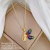 [Acero de titanio] Collar elegante y lujoso con circonitas de abeja coloridas para mujer, cadena de clavícula que combina con todo, cadena de acero de titanio.