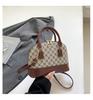 Bolsa Shell Cor Contrastante 2025 Nova Estampa Retrô Moderna Bolsa Tira Colo de Ombro Feminina Simples Casual Bolsa de Axila Moderna