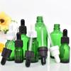 Suministro directo botella de aceite verde de 10 ml botella con gotero de 15 ml subenvasado de solución madre cosmética botella de vidrio oscuro