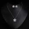 Conjunto de colar e brincos femininos de outono e inverno transfronteiriço de alta qualidade, luxo leve, com zircônia floral, versátil e doce, com um charme único, corrente de clavícula