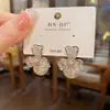 Pendientes Personalizados de Moda Transfronterizos Europeos y Americanos, Exagerados de Metal Hueco con Forma de Pétalo de Flor y Perla, Pendientes Versátiles Elegantes de Lujo Ligero