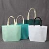 Bolsa de Hombro Biselada de Tela No Tejida Color Publicitaria de Compras Ropa Bolsa de Empaque Portátil Bolsa de Regalo Navideño Venta al por Mayor