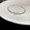 Pulseira Aberta Dupla Camada Coração de Zircônia Gota d'Água Oval Estilo Luxo Acessível Super Brilhante Joia de Mão Elegante de Nicho de Alto Padrão para Mulheres