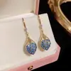Vietnam chapado en oro de arena oro real súper hada delgado forma de gota amor gancho para la oreja femenino comercio electrónico transmisión en vivo suministro de fábrica al por mayor