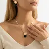 Pendientes de aro con forma de corazón de diamantes de imitación creativos, superventas transfronterizos europeos y americanos, conjunto de joyería elegante y favorecedor