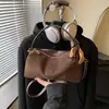 Bolsa de almofada vintage transfronteiriça para outono e inverno para mulheres, novo modelo 2026, bolsa de mão de design de nicho de alta qualidade, bolsa de ombro e transversal