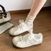 Zapatillas de entrenamiento alemanas de suela plana para mujer, nuevo modelo primavera-verano 2026, zapatillas casual populares, zapatillas blancas versátiles
