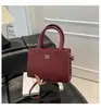 Outono 2025 Design Casual Moda Casual Casual Padrão Tecido Retro Portátil Ombro Transversal Pequena Bolsa Quadrada Mulheres