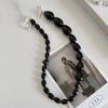 Zhang Yueer con collar de cuentas de ágata negra ovalada degradada nicho de alta gama broche de ote cadena personalizada cadena para suéter