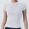 Yi Ang - Traje de yoga elástico de manga corta para mujer, camiseta ajustada transpirable para primavera y verano, para correr, fitness y deportes, disponible en stock.