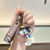 Pingente de chaveiro Snoopy de desenho animado da moda, acessório para bolsa de casal de barraca de rua, pequeno presente para máquinas de garra, atacado