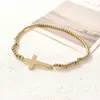 Nueva oferta especial pulsera de acero inoxidable con cuentas y colgante de cruz transfronteriza, alta calidad para mujer, cuenta redonda, acero de titanio, cordón elástico