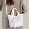 Bolso de Mujer Brocado Zhuang de Guangxi Patrimonio Cultural Inmaterial Nuevo Modelo 2026 Bolso Cesta Simple de Gama Alta Bolso de Mano Versátil Bolso de Hombro Cruzado