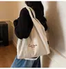 Bolso de Pana Textura Perezosa Estilo Coreano 2026 Nuevo Gran Capacidad Casual Invierno Rayado Bordado Bolso de Hombro