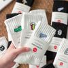 Calcetines para hombre, otoño e invierno, nuevos calcetines blancos y negros, modernos, absorbentes del sudor, deportivos, bordados, hasta media pantorrilla, calcetines de algodón para mujer.