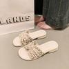 Sandalias estilo tweed para ropa exterior de mujer 2025 verano nuevo flats nicho perla playa junto al mar zapatillas