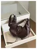 Bolsa mini de lunares con cordón estilo coreano 2026, bolsa suave y fresca para el hombro, simple y versátil para niñas, bolso cruzado para mujer