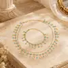 Set de collar y pulsera de concha marina y circón de moda europea y americana transfronterizo, joyería de cuello en capas de lujo ligero, venta al por mayor de accesorios
