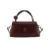 Bolso de Hombro y Mano Versátil Simple de Textura de Alta Gama para Mujer 2025 Versión Coreana Otoño Nuevo Moda Retro Bolso Versátil