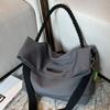 Bolsa de Grande Capacidade para Mulheres 2026 Novo Modelo Bolsa de Ombro de Lona para Estudante Universitário Bolsa de Mão de Tecido de Nylon Bolsa Tote para o Dia a Dia