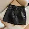 Falda corta de cuero PU media falda mujer 2026 Otoño Invierno nuevo estilo cintura alta falda negra chica popular línea A envolvente de cadera falda corta de cuero