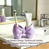 Soporte para cepillos de dientes con forma de lazo Sin instalación Plástico Soporte de almacenamiento Baño Dormitorio Tipo bolígrafo Soporte de exhibición para cepillos de dientes