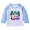 Camiseta infantil de primavera y otoño 2023, nueva camiseta de manga larga con cuello redondo y dibujos animados, camiseta de algodón para bebés y niños.