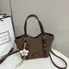 Bolsa sacola moderna e simples para o dia a dia de mulheres, nova coleção outono 2026, versão coreana estilosa, alta estética, bolsa de ombro único/sob o braço