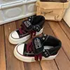 Zapatos de lona de caña alta para mujer, zapatos negros, nuevo modelo otoño 2026, zapatillas de estudiante para mujer, zapatos casuales versátiles y de moda